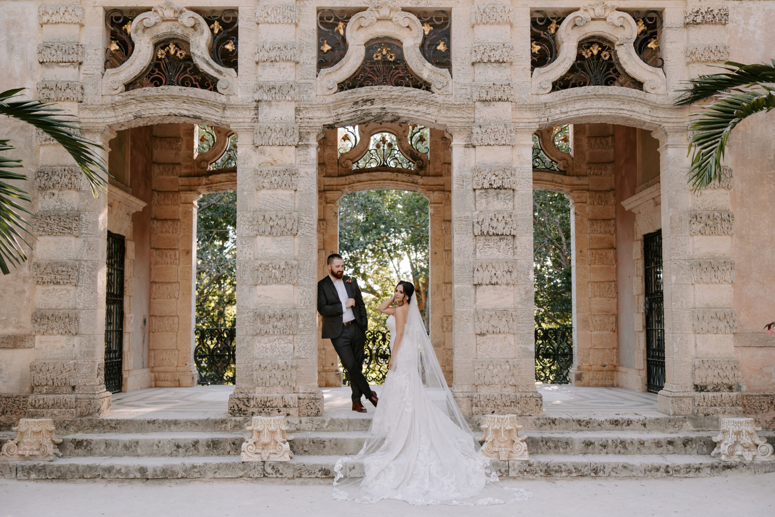 Christina & Spencer pose at Vizcaya Gardens